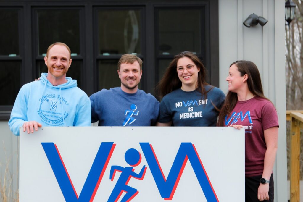 The variable Movement Team standing outside their gym